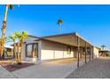 Home with carport and desert landscaping at 8103 E Southern Ave # 311, Mesa, AZ 85209