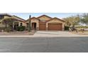 House exterior with two car garage and desert landscaping at 2764 N Sterling St, Mesa, AZ 85207