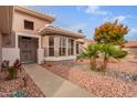 Welcoming walkway leading to the front door of the house at 15192 W Las Brizas Ln, Sun City West, AZ 85375