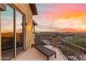 Deck with lounge chair and scenic sunset view at 2724 S Falling Star Rd, Gold Canyon, AZ 85118