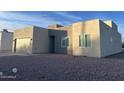 New construction home with contemporary design and gravel driveway at 1278 W Calle Tuberia --, Casa Grande, AZ 85194
