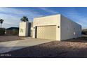 View of the home's exterior, showcasing its clean lines and desert landscaping at 1298 W Calle Tuberia --, Casa Grande, AZ 85194