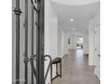 Bright foyer with tile flooring and a view to the backyard at 4630 S Amethyst Dr, Chandler, AZ 85249