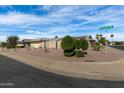 Ranch style home with mature landscaping and a corner lot at 13218 W Prospect Dr, Sun City West, AZ 85375