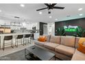 Open living area with contemporary furniture and kitchen views at 2401 N 37Th St, Phoenix, AZ 85008
