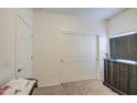 Bright bedroom featuring a large closet and dresser at 2438 E Atlanta Ave, Phoenix, AZ 85040