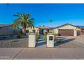 Single story home with a modern exterior and a landscaped front yard at 8856 E Altadena Ave, Scottsdale, AZ 85260