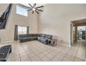 Spacious living room with high ceilings and a large sectional sofa at 590 W 12Th St, Florence, AZ 85132