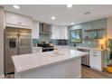 Modern kitchen with stainless steel appliances and white shaker cabinets at 3502 E Janice Way, Phoenix, AZ 85032
