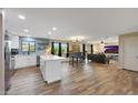 Open concept living and kitchen with hardwood floors at 3502 E Janice Way, Phoenix, AZ 85032