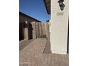 Brick walkway leads to front gate and house entrance at 18390 W Via Del Sol --, Surprise, AZ 85387