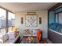Cozy covered patio with seating area, perfect for relaxing outdoors at 3104 E Broadway Rd # 22, Mesa, AZ 85204