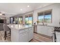 Spacious kitchen featuring granite countertops and stainless steel appliances at 43301 N National Trl, Anthem, AZ 85086