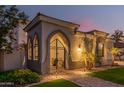 Ornate wrought iron entry gate leading to a private courtyard at 945 W Elm St, Litchfield Park, AZ 85340