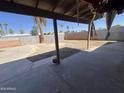 Backyard view under covered patio at 318 W Lawrence Blvd, Avondale, AZ 85323