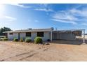 Ranch home with attached carport and large yard at 456 N 96Th Pl, Mesa, AZ 85207