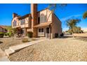 Two-story brick townhouse with a charming facade at 8111 W Wacker Rd # 124, Peoria, AZ 85381