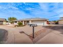 House exterior view, showing the front entrance and driveway at 11815 N Rio Vista Dr, Sun City, AZ 85351