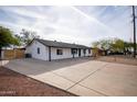 Newly renovated single story home with modern exterior and landscaping at 1501 W Grovers Ave, Phoenix, AZ 85023