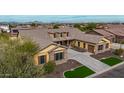 Luxury home with a large driveway and landscaping at 3234 E Ian Dr, Phoenix, AZ 85042