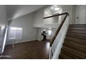 Open concept living area with loft and hardwood floors at 7434 N 44Th Dr, Glendale, AZ 85301
