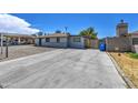 Single story home with concrete driveway at 3530 N 63Rd Dr, Phoenix, AZ 85033