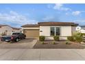 View of the garage and driveway with a truck parked at 10986 N Northfield St, Surprise, AZ 85388