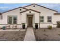 Inviting front entrance with a pathway leading to a double door at 10986 N Northfield St, Surprise, AZ 85388