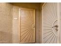 Condo entry with a security door and numbered address at 2228 N 52Nd St # 240, Phoenix, AZ 85008