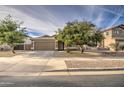 Front view of a single story house with a two-car garage at 22349 E Via Del Palo --, Queen Creek, AZ 85142