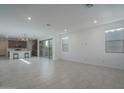 Open concept living area with kitchen and dining views at 1057 S 151St Ln, Goodyear, AZ 85338