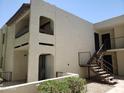 Apartment building exterior showing stairs and building features at 10444 N 69Th St # 220, Paradise Valley, AZ 85253