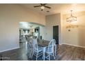 Dining room features a table with chairs and a view into the living area at 1113 N Cota Ln, Coolidge, AZ 85128