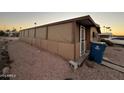 Side view of a tan manufactured home with covered patio at 6723 W Fillmore St # 301, Phoenix, AZ 85043