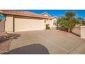 Spacious driveway offering ample parking space at 10714 E Nacoma Dr, Sun Lakes, AZ 85248