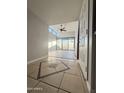 Tile entryway with a view of the bright living room at 16041 N 31St St # 16, Phoenix, AZ 85032