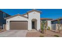 New construction home with a two-car garage and front yard landscaping at 22862 E Bonanza Way, Queen Creek, AZ 85142