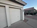 Two-car garage with automatic door opener at 24809 S Drifter Dr, Sun Lakes, AZ 85248