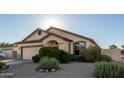 Single-story home with a two-car garage and desert landscaping at 28320 N Tourmaline Dr, San Tan Valley, AZ 85143