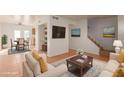 Spacious living room with furniture, and a staircase at 3605 W Bethany Home Rd # 21, Phoenix, AZ 85019