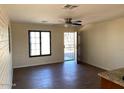 Bright living room featuring tile floors and a ceiling fan at 925 E Henry St, Tempe, AZ 85288