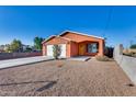 Front yard view of single story home with gravel landscaping at 10638 N 15Th Ln, Phoenix, AZ 85029