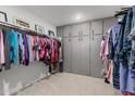 Spacious walk-in closet with hanging rods and shelves at 15506 S 180Th Ln, Goodyear, AZ 85338