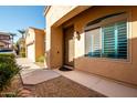 Home exterior showcasing entryway and walkway at 1972 W Olive Way, Chandler, AZ 85248