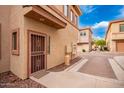 Building exterior showing entrance and walkway at 42424 N Gavilan Peak Pkwy # 42206, Anthem, AZ 85086