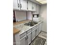Updated kitchen features granite countertops and modern appliances at 540 N May St # 2109, Mesa, AZ 85201