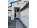 Front entrance with a security door and brick walkway at 5417 W Kerry Ln, Glendale, AZ 85308