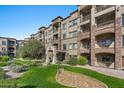 Tuscana complex building with landscaping and lawn at 5350 E Deer Valley Dr # 3418, Phoenix, AZ 85054