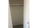 Empty closet with a hanging rod and light flooring at 2608 W Berridge Ln # 220, Phoenix, AZ 85017