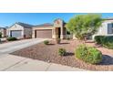 Two-story home with a two-car garage and a well-maintained front yard at 28658 N Geode Dr, San Tan Valley, AZ 85143